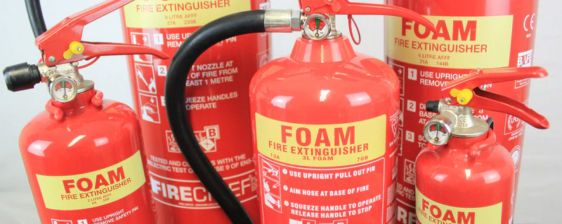 foam fire extinguishers placed side by side