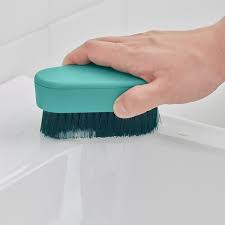 Scrubbing brush is one of the tools  used in cleaning a new house.