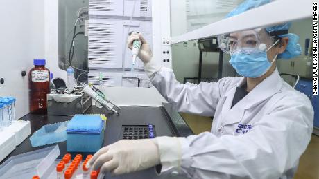 China approves Sinopharm Covid-19 vaccine, promises free shots for all citizens