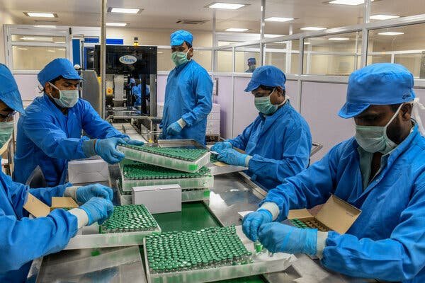 Workers packing doses of the Covishield vaccine at the Serum Institute of India in Pune. Nepal approved the vaccine on Friday.