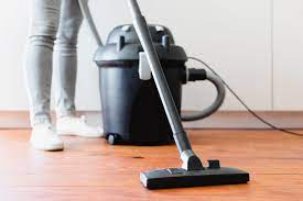 This picture depicts a vacuum cleaner being used in cleaning.